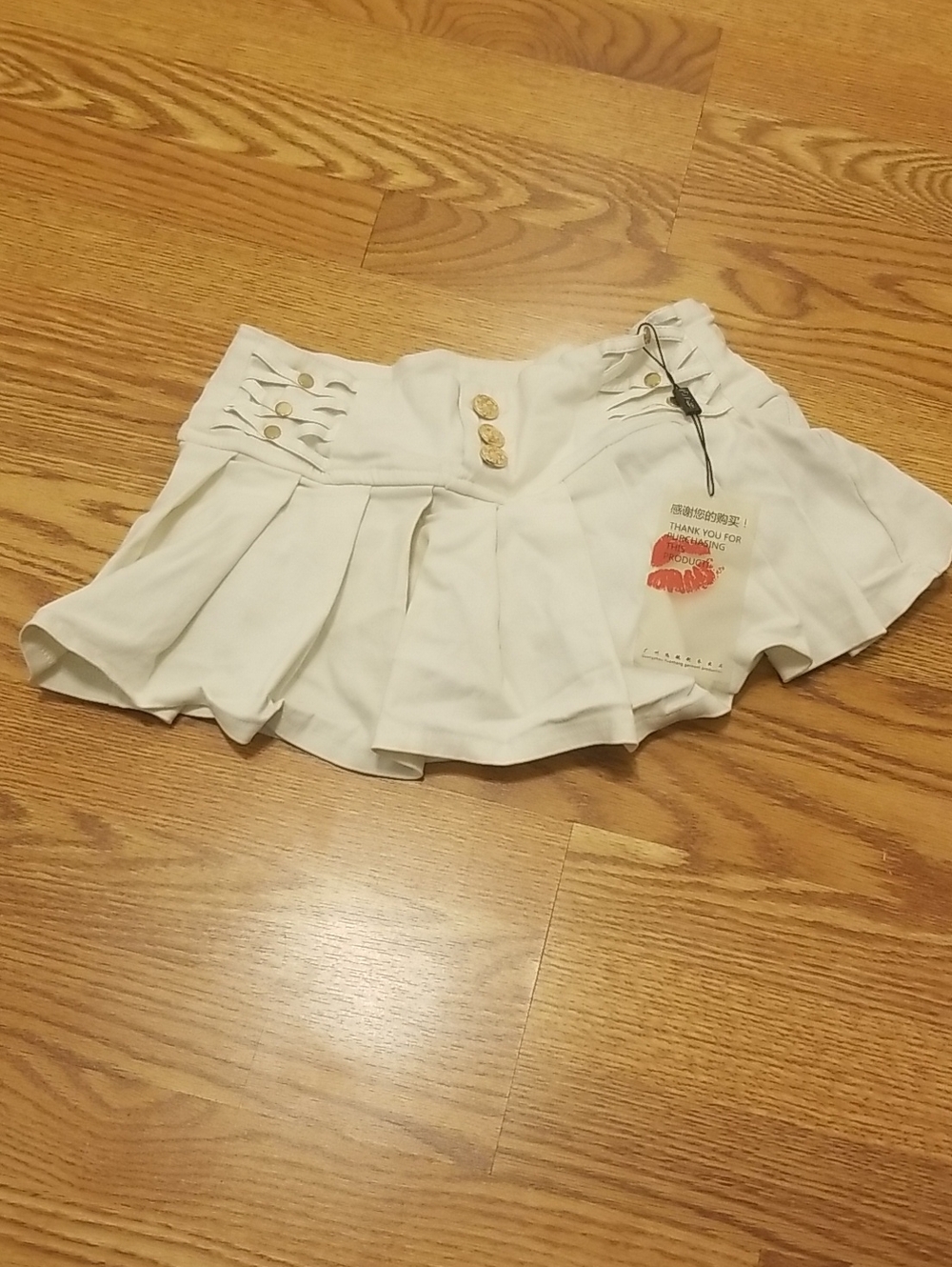 NWT Women's Cream Pleated Skort with Decorative Buttons